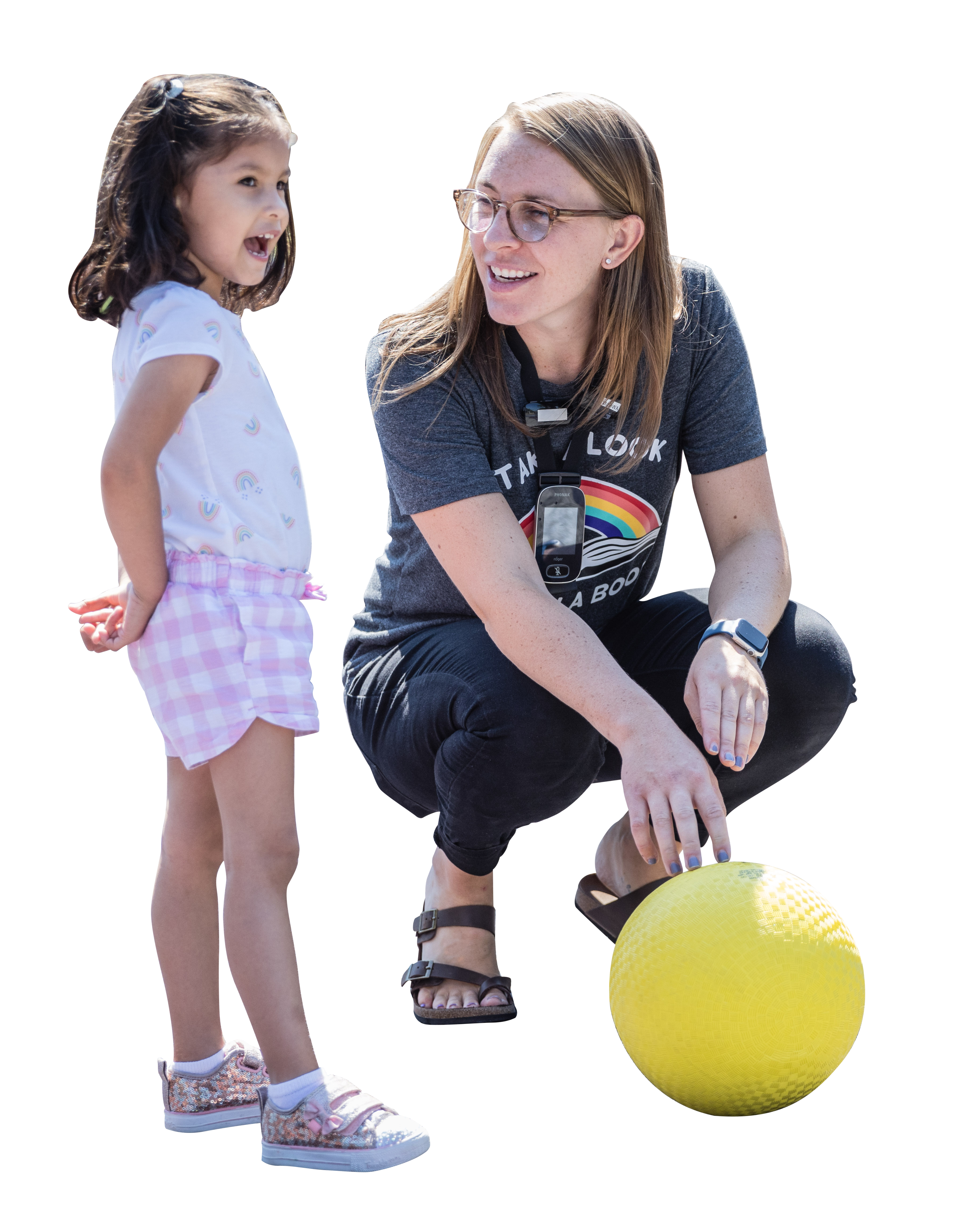 Children's Voice_ Cherney 0399 Woman holding a yellow ball for a little girl